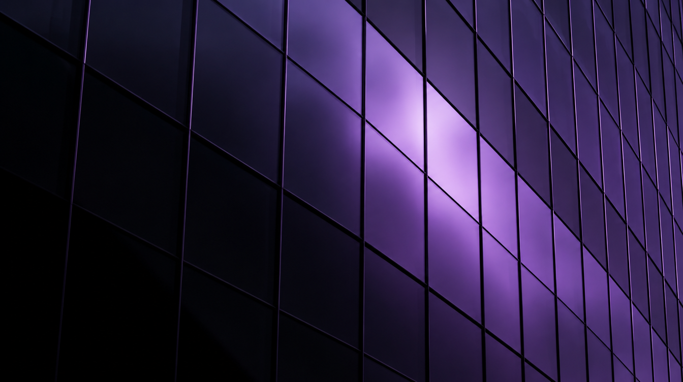 Dark tinted glass facade of a commercial building